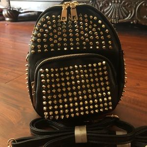 Women’s black studded bag